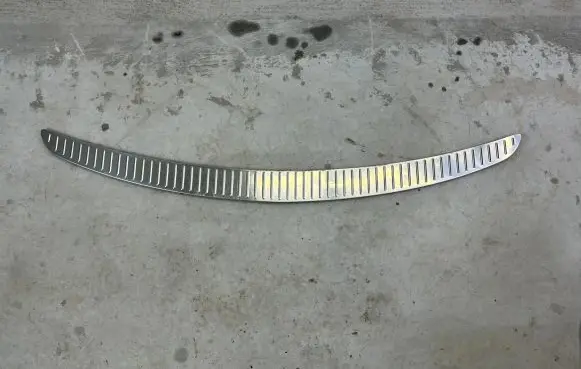 Rear bumper trim bar molding