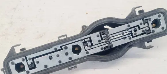 Tail light bulb cover holder