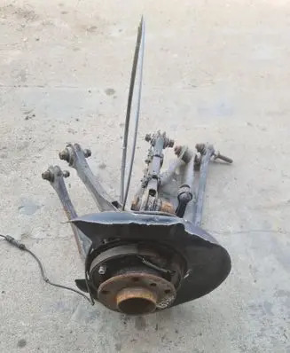 Rear wheel hub spindle/knuckle