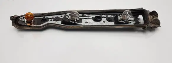 Opel Corsa C Tail light bulb cover holder