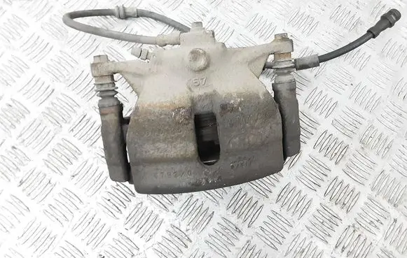 Volkswagen Golf VII Front brake caliper 