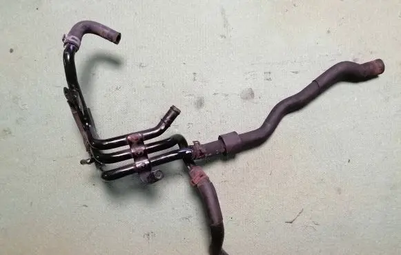 Skoda Octavia Mk3 (5E) Engine coolant pipe/hose 04L121064G