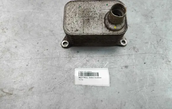 Volkswagen PASSAT CC Engine oil radiator 06j117021j 06J117021J 06J117021P