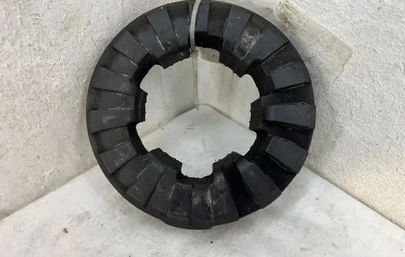 Jaguar XE Rear coil spring rubber mount FK725A327AA