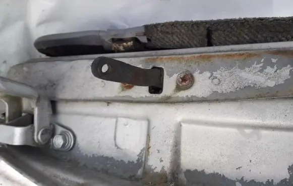 Rear door check strap stopper