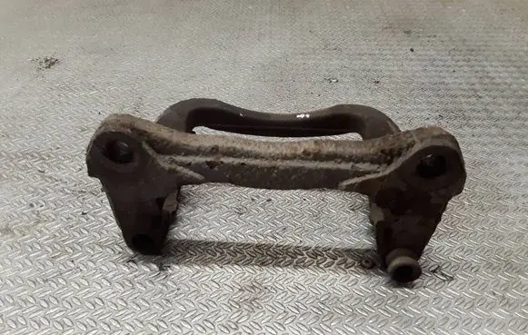 Mazda CX-7 Front Brake Caliper Pad/Carrier 