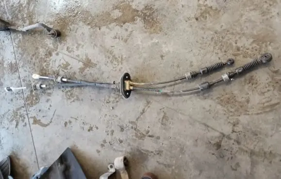 KIA Sportage Gear shift cable linkage 437943U300