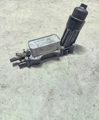 Dodge Grand Caravan Oil filter mounting bracket 68105583AF P19F1518