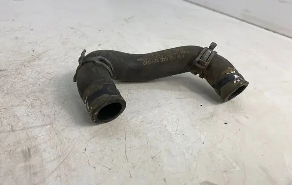 Volkswagen Polo V 6R Engine coolant pipe/hose 04B121049