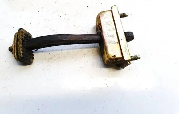Mazda 626 Rear door check strap stopper 5173991j25a 72270a