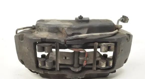 Volkswagen Touareg I Front brake caliper 