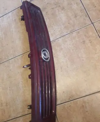 Mazda 626 Front bumper upper radiator grill ME040