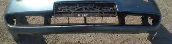 Nissan Primera Front bumper melynas