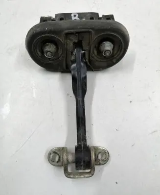 Front door check strap stopper