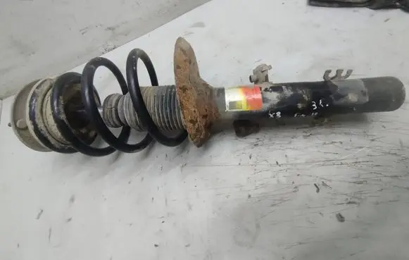 BMW X3 E83 Front shock absorber with coil spring 