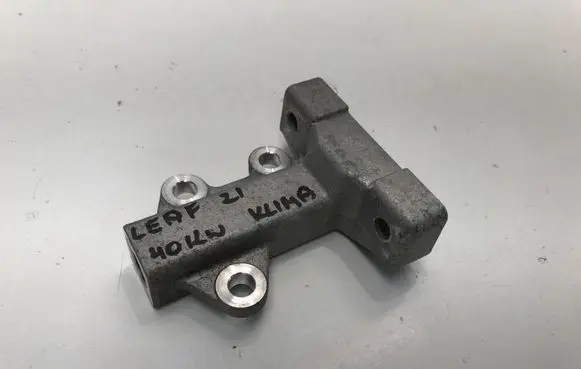 Nissan Leaf II (ZE1) A/C compressor mount bracket 