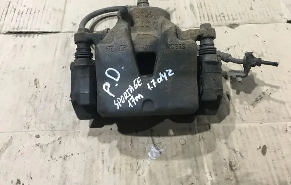 KIA Sportage Front brake caliper