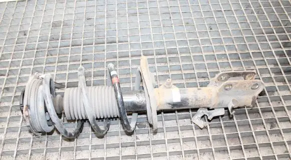 Nissan Leaf I (ZE0) Front shock absorber/damper