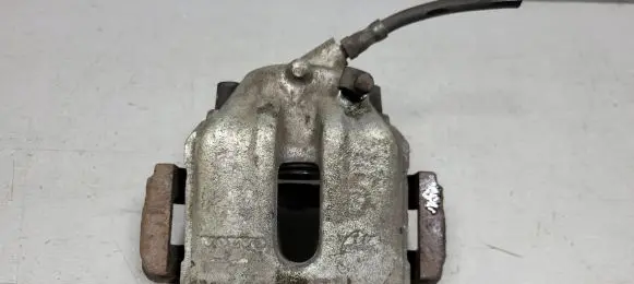 Volvo V70 Front brake caliper 8602676