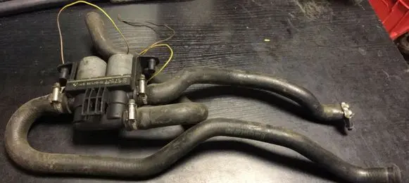 Coolant heater control valve