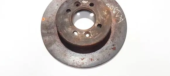 Renault Laguna I Rear brake disc neventiliuojamas