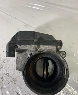 Volkswagen Golf V Throttle valve 03G128063M A2C53324665