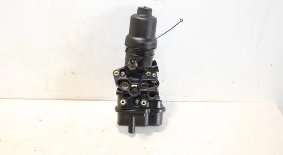 Volkswagen Eos Oil filter mounting bracket 06D115397G