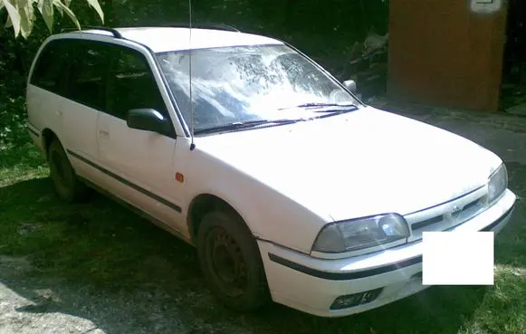 Nissan Primera Front door window glass four-door