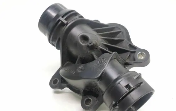 Thermostat/thermostat housing