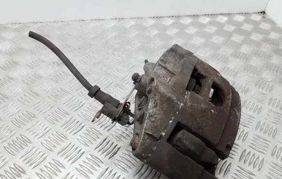 Audi A6 S6 C6 4F Front brake caliper 973