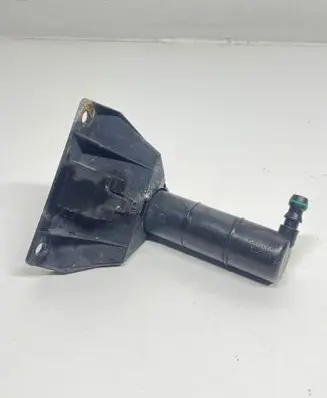 Volkswagen Touran I Headlight washer spray nozzle 1T0955978A 8WT00945300