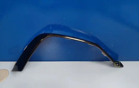 Rear bumper trim bar molding