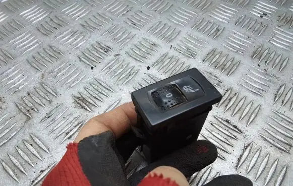 Seat heating switch
