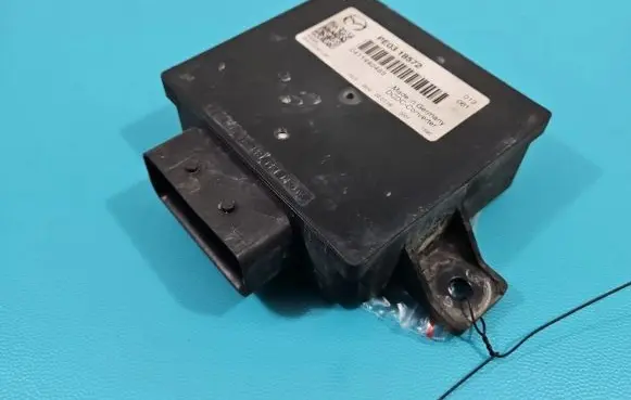 Mazda CX-5 Central body control module PE0318572 IMPRK1392204