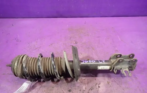 Opel Corsa D Front shock absorber with coil spring 