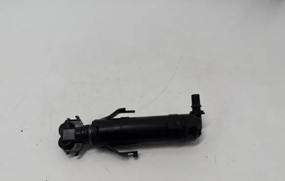 Volkswagen Touran II Headlight washer spray nozzle 1T0955104B