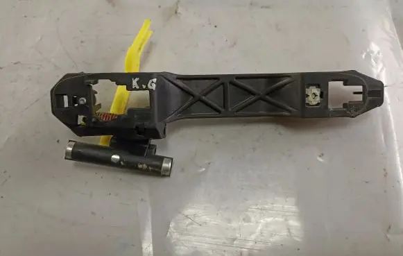 Rear door exterior handle/bracket