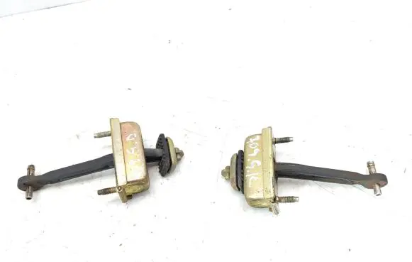 Mazda 626 Rear door check strap stopper 5173991 GE4T722070A LHGE4T722070A