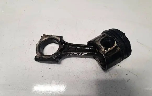 Opel Astra H Piston with connecting rod 