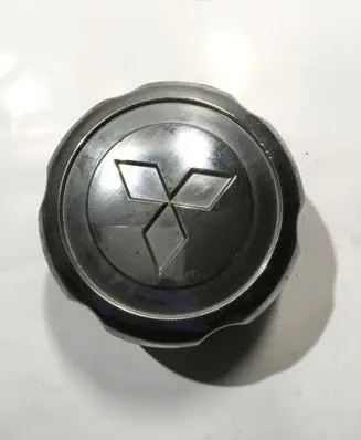 Mitsubishi L200 Original wheel cap MB816581