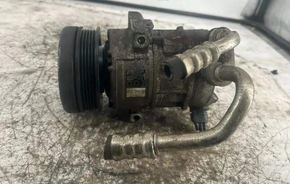 Opel Corsa E Air conditioning (A/C) compressor (pump) 55701200
