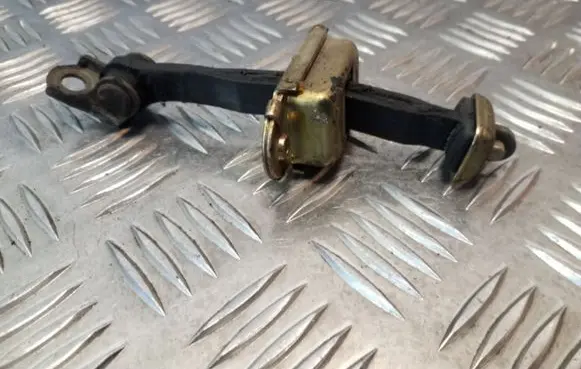 Nissan Almera Tino Front door check strap stopper