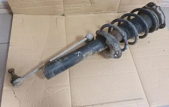 Front shock absorber with coil spring