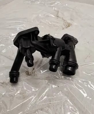Thermostat/thermostat housing