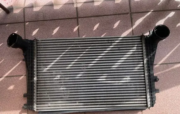 Volkswagen Golf V Intercooler radiator 1K0145803T