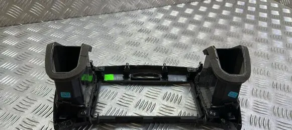 Nissan Juke I F15 Dash center air vent grill 687501FE0A