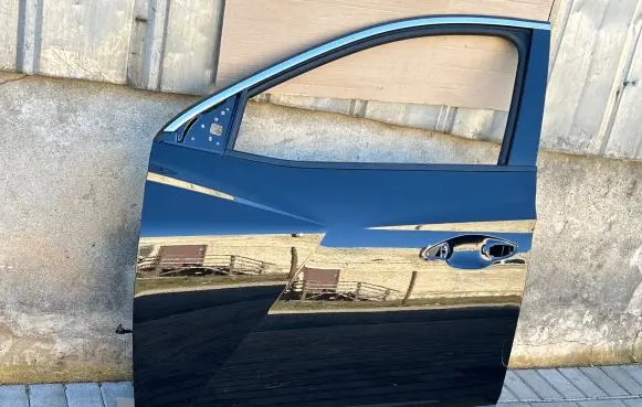 Hyundai Tucson IV NX4 Front door