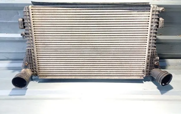 Volkswagen Golf V Intercooler radiator 1K0145928A