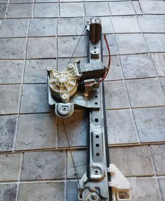 Rear door window regulator with motor