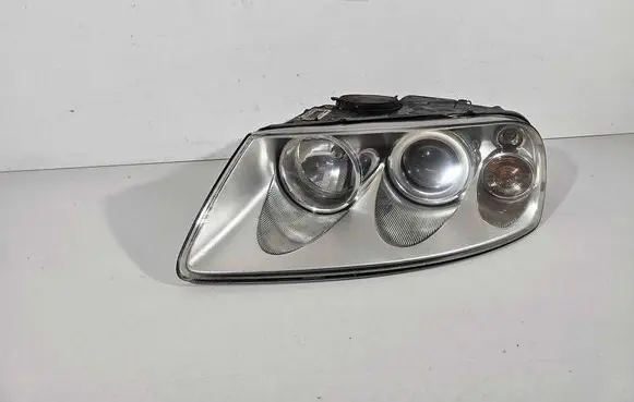 Volkswagen Touareg I Headlight/headlamp 103419012887